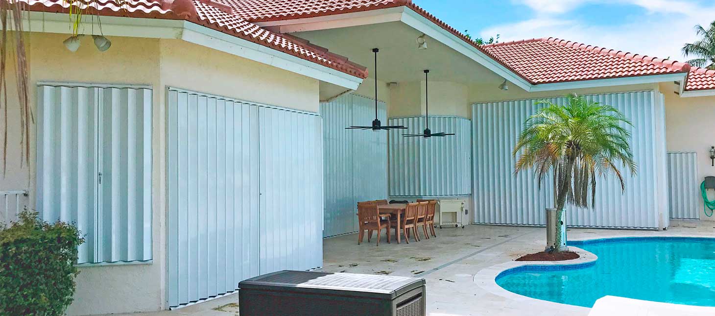 patio with accordion shutters